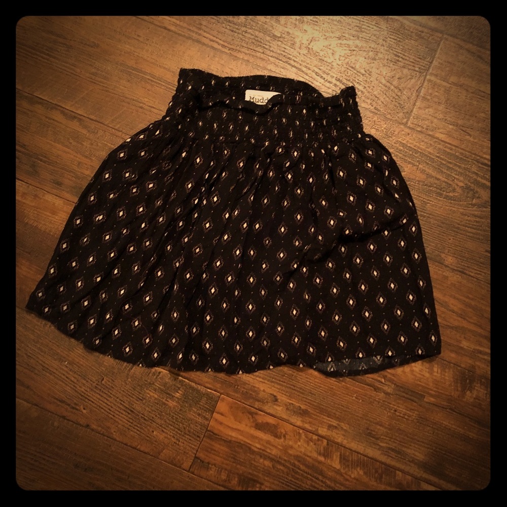 Smocked, high waisted skirt.